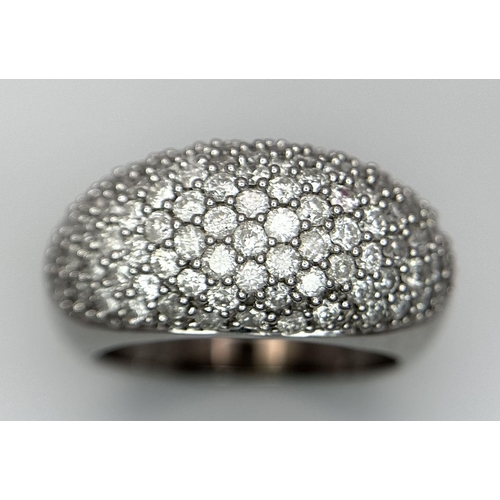 226 - A STUNNING WHITE GOLD 9K GOLD DIAMOND PAVE DRESS RING - 2 CTW (APPROX) OF BRIGHT CUT DIAMONDS. HEAVY... 