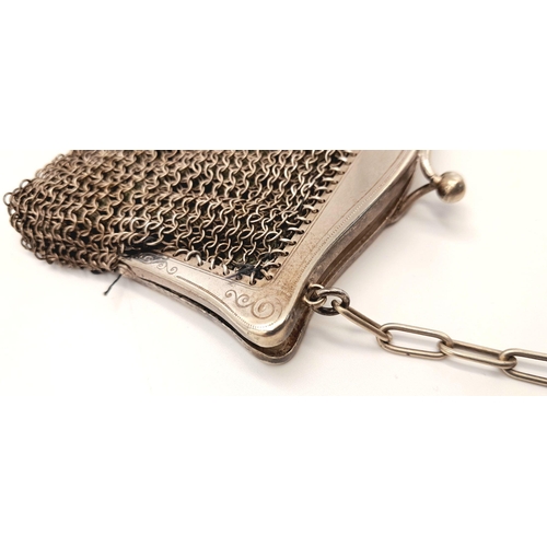 245 - Vintage SILVER MESH EVENING BAG/PURSE . Silk lined with silver plated fittings. Some signs of wear.a... 