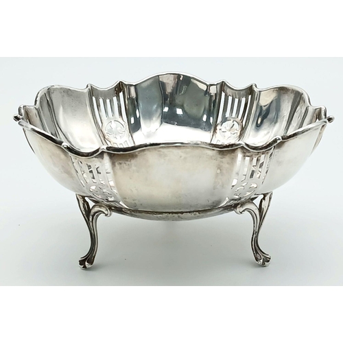 259 - Beautiful large antique SILVER BON BON DISH. Pierced decoration with serpentine rim. Standing on thr... 