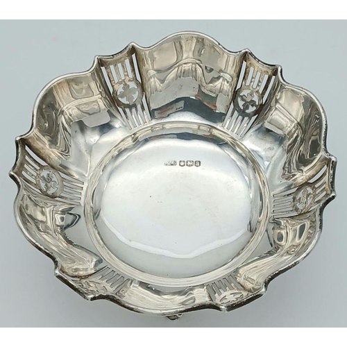 259 - Beautiful large antique SILVER BON BON DISH. Pierced decoration with serpentine rim. Standing on thr... 