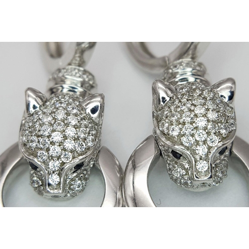 27 - A PAIR OF 14K WHITE GOLD DIAMOND SET PANTHER DROP EARRINGS. 10.5G TOTAL WEIGHT, 3.5cm LENGTH. Ref: T... 