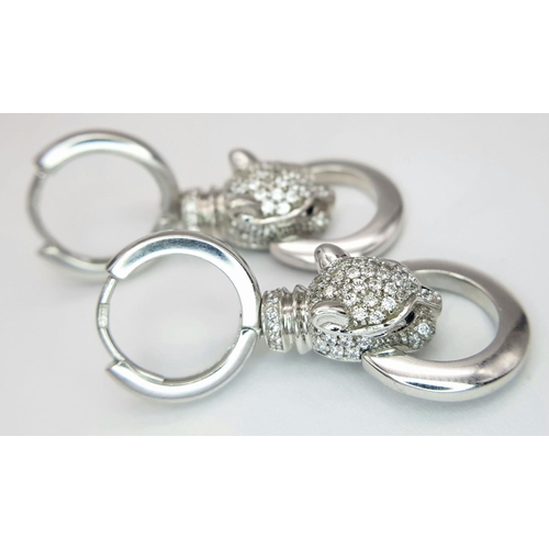 27 - A PAIR OF 14K WHITE GOLD DIAMOND SET PANTHER DROP EARRINGS. 10.5G TOTAL WEIGHT, 3.5cm LENGTH. Ref: T... 