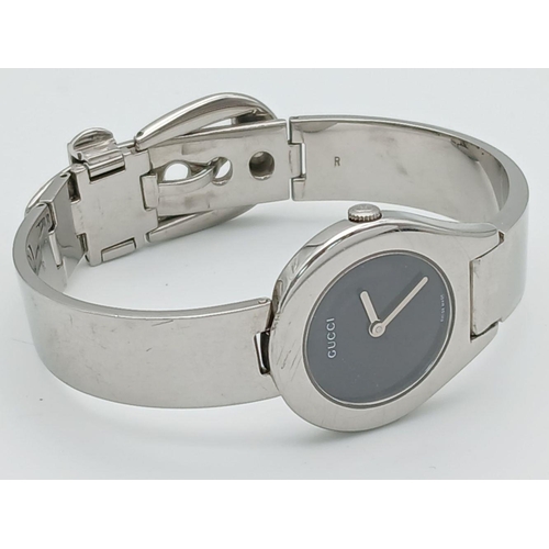 364 - Ladies genuine GUCCI 6700L WRISTWATCH. Finished in stainless steel chrome .Having Circular black fac... 