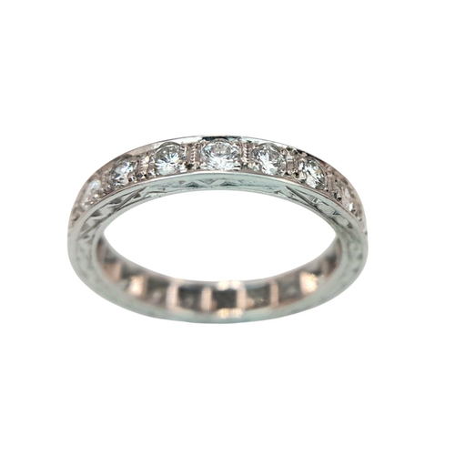 37 - AN 18K WHITE GOLD DIAMOND SET FULL ETERNITY RING. 0.90CTW, 3.3G, SIZE K 1/2. Ref: A/S 1173