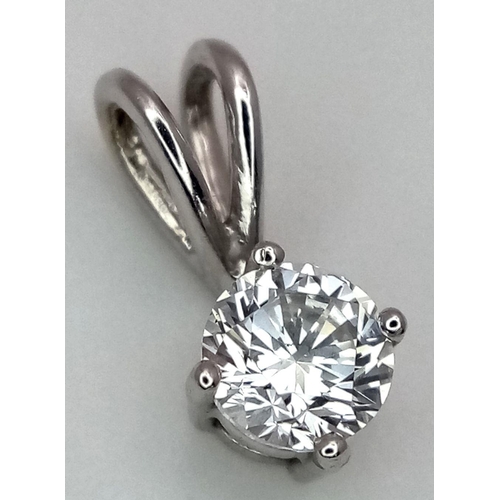 405 - AN 18K WHITE GOLD DIAMOND SET 4 CLAW PENDANT. ROUND BRILIANT CUT 0.40CT. 0.7G TOTAL WEIGHT, 1.2CM LE... 