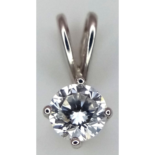 405 - AN 18K WHITE GOLD DIAMOND SET 4 CLAW PENDANT. ROUND BRILIANT CUT 0.40CT. 0.7G TOTAL WEIGHT, 1.2CM LE... 