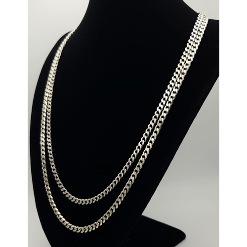 415 - Two Attractive Solid Silver 925 Curb Chain Necklaces, Total wright: 35.4 grams, 53 and 62 cm. Both i... 