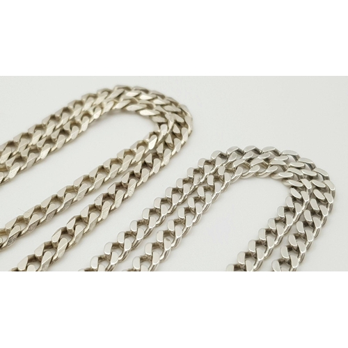 415 - Two Attractive Solid Silver 925 Curb Chain Necklaces, Total wright: 35.4 grams, 53 and 62 cm. Both i... 