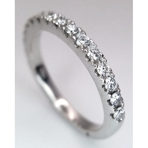 461 - AN 18K WHITE GOLD HALF SET BAND RING. 0.40CTW, 2.7G, SIZE L. Ref: SC 9046