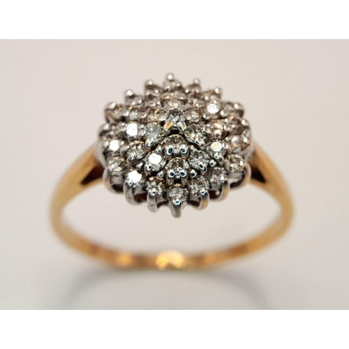 547 - A 9k yellow gold diamond cluster ring, 0.20ct diamond weight, 2.5g total weight, size Q 1/2. Ref: 77... 