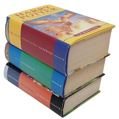 570 - A Parcel of Three Harry Potter First Edition Hardback Books Including the Rare Misprint Edition of H... 