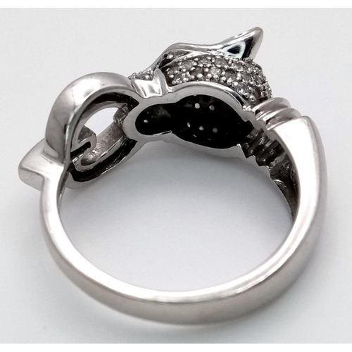 6 - A 14K WHITE GOLD DIAMOND SET PANTHER RING. 7.1G, SIZE N. Ref: TAN 7012