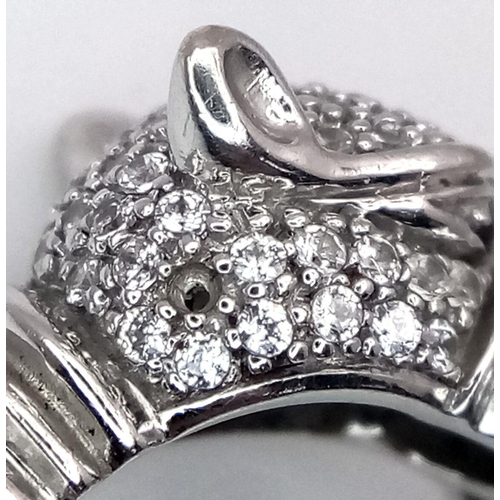 6 - A 14K WHITE GOLD DIAMOND SET PANTHER RING. 7.1G, SIZE N. Ref: TAN 7012