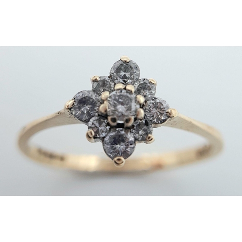 601 - A 9K YELLOW GOLD DIAMOND CLUSTER RING. 0.20CTW, 1.4G, SIZE O. Ref: JR S 98