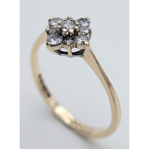 601 - A 9K YELLOW GOLD DIAMOND CLUSTER RING. 0.20CTW, 1.4G, SIZE O. Ref: JR S 98