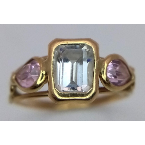 77 - Vintage 18 CARAT GOLD RING set with CRYSTAL QUARTZ and AMETHYST . Having Clear centre stone with PEA... 