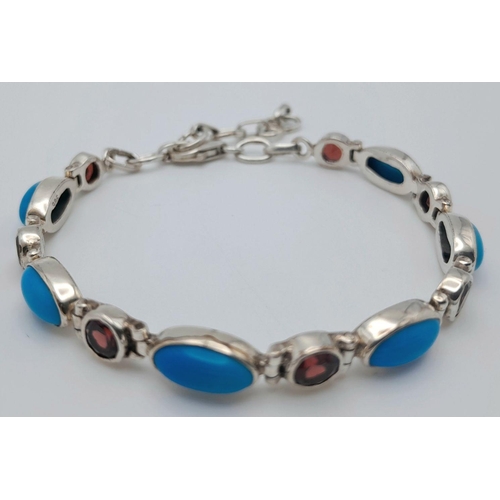 822 - A Sterling Silver Garnet and Turquoise Bracelet- 20cm Length. Gross Weight 9.78 Grams