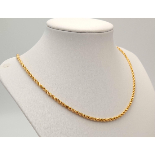 1 - A 46cms ROPE TWIST NECK CHAIN IN 18K GOLD IN AS NEW CONDITION.   9.8gms