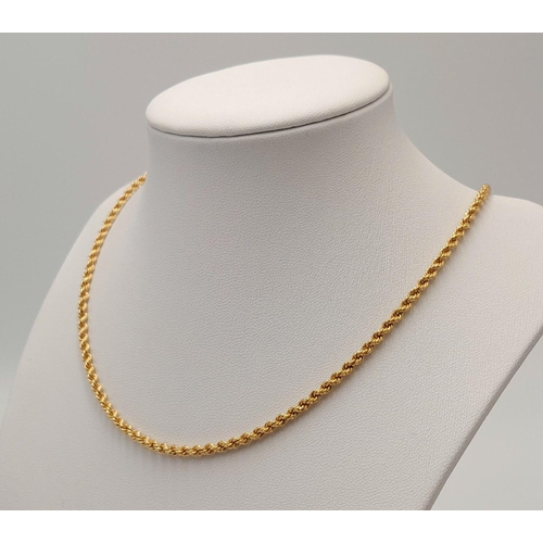 1 - A 46cms ROPE TWIST NECK CHAIN IN 18K GOLD IN AS NEW CONDITION.   9.8gms