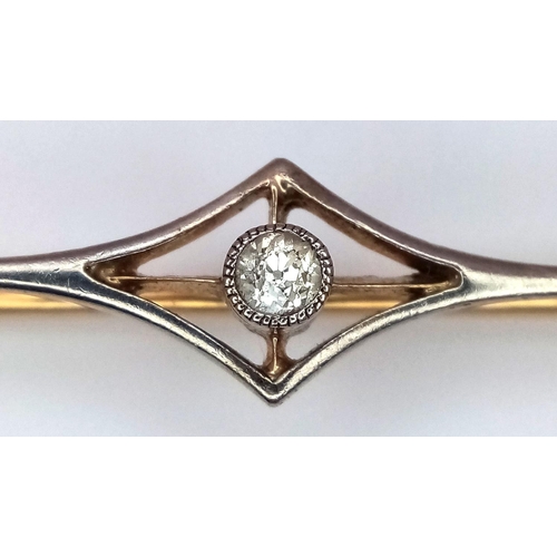 126 - Beautiful Antique 15 CARAT GOLD BROOCH with DIAMOND. Complete with gold safety chain. Consisting a w... 