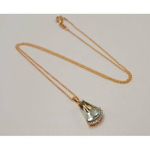 136 - A 18K YELLOW GOLD GREEN GARNET & DIAMOND PENDANT ON 46CM CHAIN. 4.4G TOTAL WEIGHT , 2.1CM DROP PENDA... 