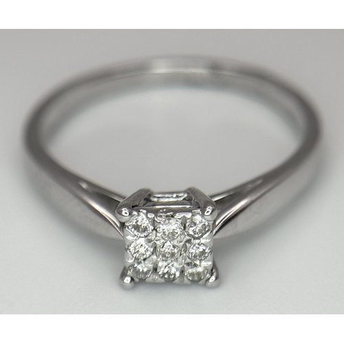 267 - A 18k white gold diamond square cluster ring, 0.15ct diamond weight, 3g total weight, size O. Ref: 2... 