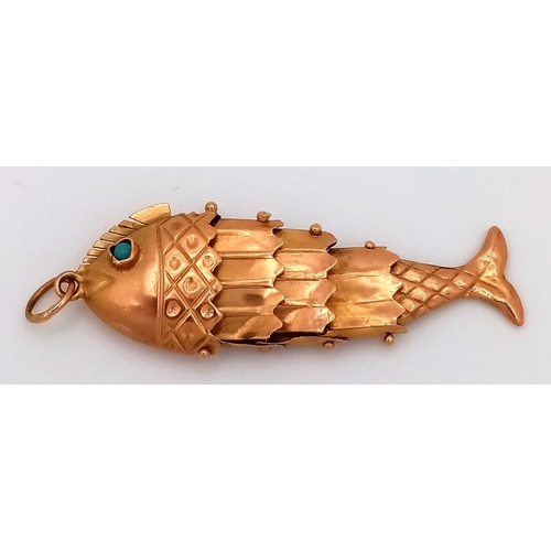 379 - A 9K Yellow Gold Articulated Fish Pendant with Turquoise Eyes! 4.5cm. 2.6g