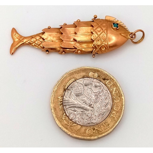 379 - A 9K Yellow Gold Articulated Fish Pendant with Turquoise Eyes! 4.5cm. 2.6g