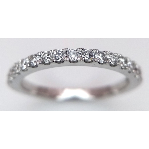 419 - A 18K WHITE GOLD DIAMOND SET HALF ETERNITY RING 0.35CT 2.5G SIZE L. Ref: SC 9044