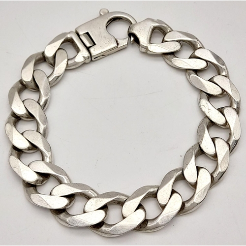 433 - A STERLING SILVER HEAVY CURB BRACELET 73G , 23CM IN LENGTH. Ref: SC 9035