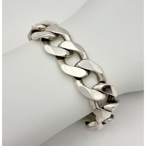 433 - A STERLING SILVER HEAVY CURB BRACELET 73G , 23CM IN LENGTH. Ref: SC 9035