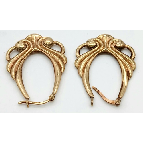 456 - A PAIR OF GOTHIC STYLE HOOP EARRINGS .   2.5gms