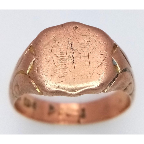 47 - AN ANTIQUE 9K ROSE GOLD GENTS SIGNET RING WITH SHIELD SHAPE FACE AND ORNATE SHOULDERS .   6.1gms    ... 