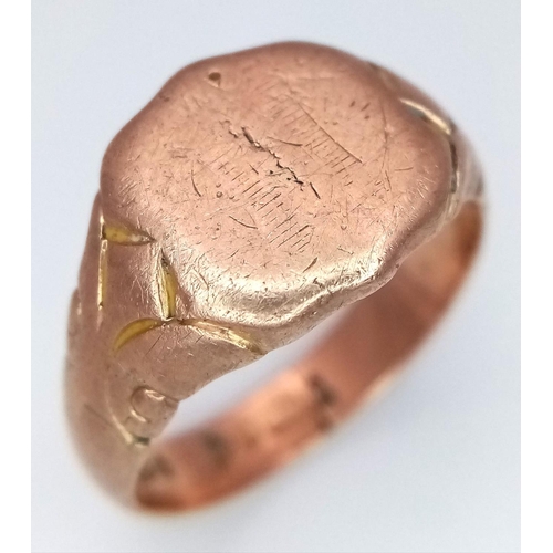 47 - AN ANTIQUE 9K ROSE GOLD GENTS SIGNET RING WITH SHIELD SHAPE FACE AND ORNATE SHOULDERS .   6.1gms    ... 