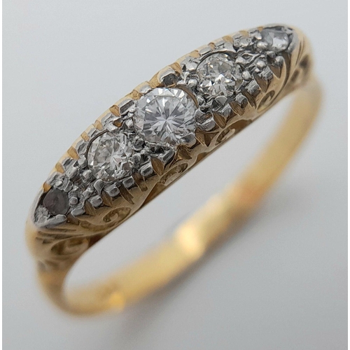 521 - An 18K Yellow Gold Five Stone Diamond Ring. Size P 1/2. 3.55g total weight. NLG 21354