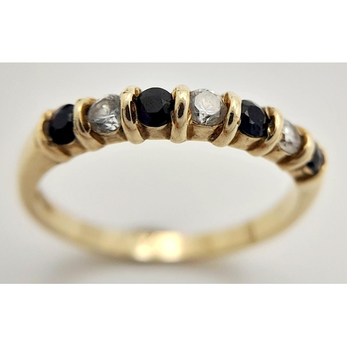 546 - Elegant 9 CARAT GOLD RING having SPINEL and CLEAR ZIRCONIA sweep set to top. Full UK hallmark. 2.05 ... 