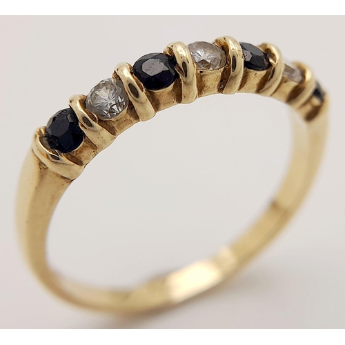 546 - Elegant 9 CARAT GOLD RING having SPINEL and CLEAR ZIRCONIA sweep set to top. Full UK hallmark. 2.05 ... 