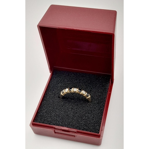 546 - Elegant 9 CARAT GOLD RING having SPINEL and CLEAR ZIRCONIA sweep set to top. Full UK hallmark. 2.05 ... 