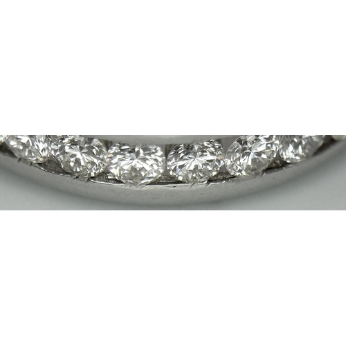 65 - A PAIR OF 18K WHITE GOLD DIAMOND SET 1/2 HOOP EARRINGS. 1.54CTW, 8.9G, 2.2CM DIAMETER. NEED BUTTERFL... 