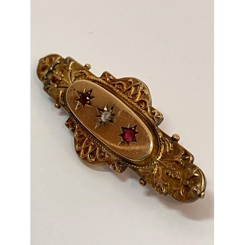 63 - Antique 9 CARAT GOLD BROOCH. DIAMOND CENTRE STONE. Clear hallmark for Chester 1896. 2.95 grams.