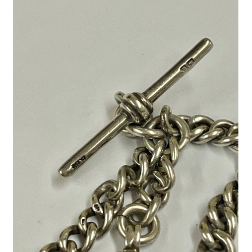 1047 - An Antique silver double Albert watch chain with silver fob , 57.4 grams, 41cm in length.