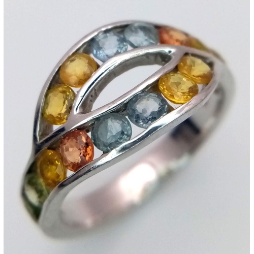 1008 - An extremely pretty and unusual TOPAZ and SILVER RING from THE GENUINE GEMSTONE COMPANY. Consisting ... 