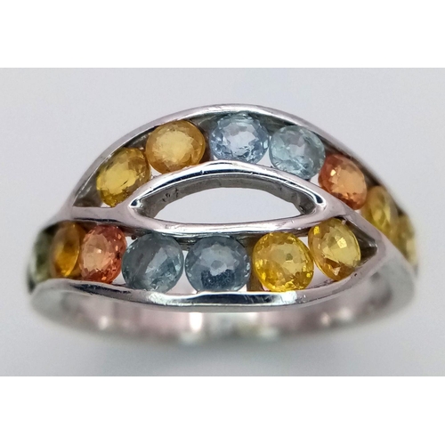 1008 - An extremely pretty and unusual TOPAZ and SILVER RING from THE GENUINE GEMSTONE COMPANY. Consisting ... 