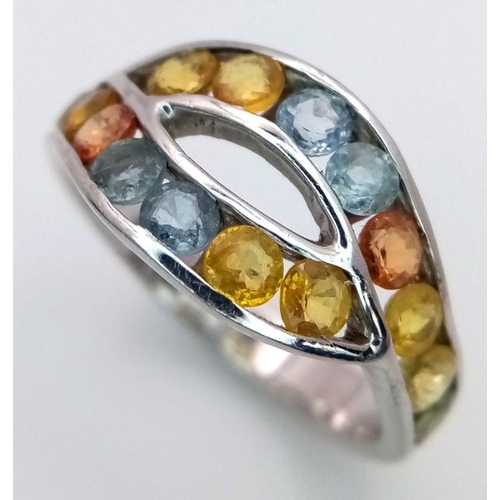 1008 - An extremely pretty and unusual TOPAZ and SILVER RING from THE GENUINE GEMSTONE COMPANY. Consisting ... 