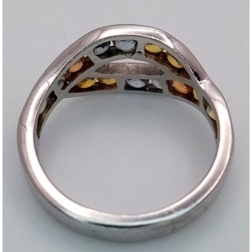 1008 - An extremely pretty and unusual TOPAZ and SILVER RING from THE GENUINE GEMSTONE COMPANY. Consisting ... 