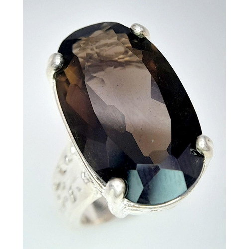 1036 - An Impressive Vintage Sterling Silver and Large Smoky Quartz Set Ring Size N. Set with a 2.5cm Lengt... 