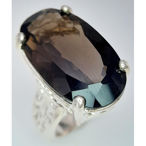 1036 - An Impressive Vintage Sterling Silver and Large Smoky Quartz Set Ring Size N. Set with a 2.5cm Lengt... 