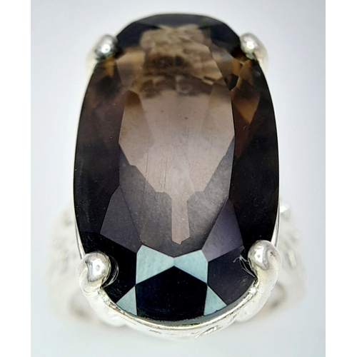 1036 - An Impressive Vintage Sterling Silver and Large Smoky Quartz Set Ring Size N. Set with a 2.5cm Lengt... 