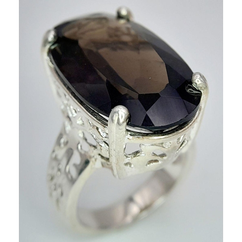 1036 - An Impressive Vintage Sterling Silver and Large Smoky Quartz Set Ring Size N. Set with a 2.5cm Lengt... 