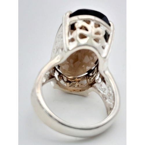 1036 - An Impressive Vintage Sterling Silver and Large Smoky Quartz Set Ring Size N. Set with a 2.5cm Lengt... 